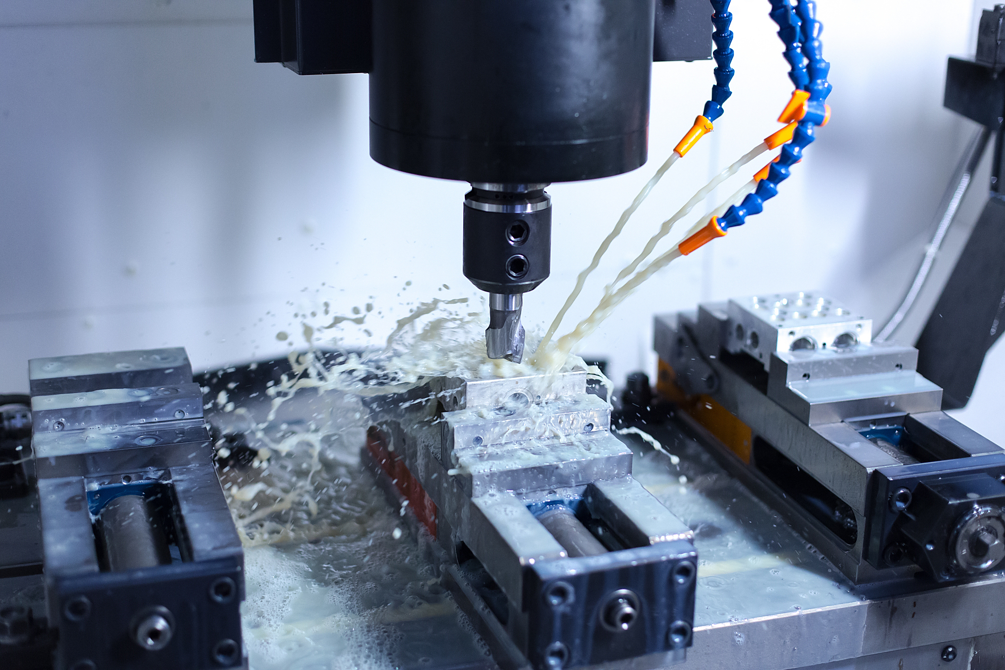 CNC milling with coolant for stable cutting and improved finish